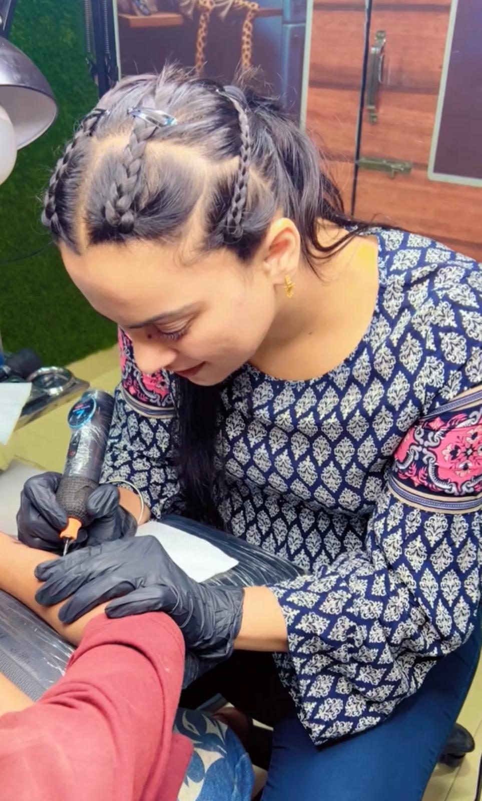 Prabh creating a tattoo